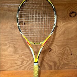 HEAD Racket with Yellow and Red Accents